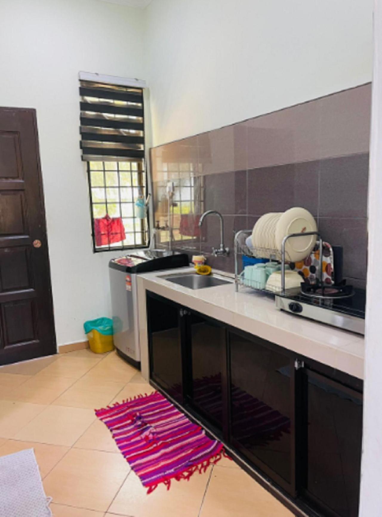 Faris'S Homestay & Resort Pasir Puteh Bagian luar foto